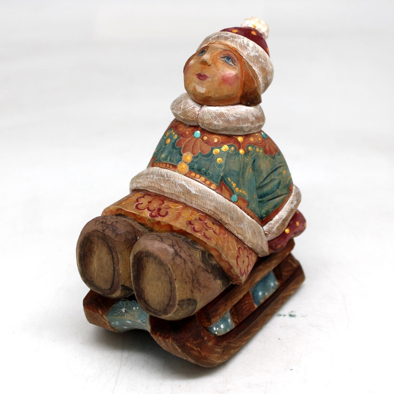 One-of-a-Kind – Girl on Sleigh WOODCARVED Figurine 4.5×3.5×2.5 by  – Unique Handcrafted and Hand-Painted Collectible
