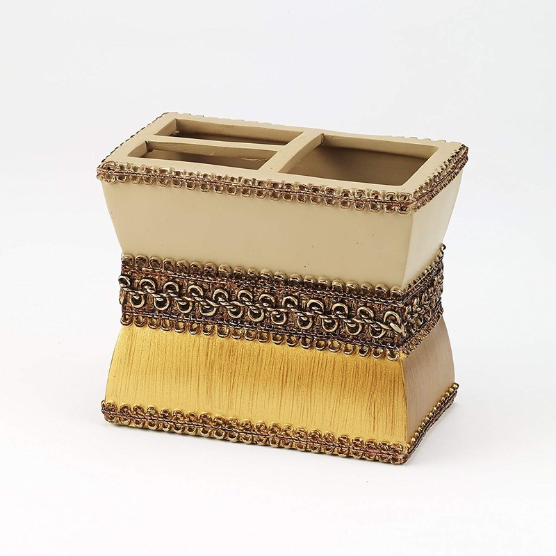 Avanti Linens Braided Medallion Toothbrush Holder.