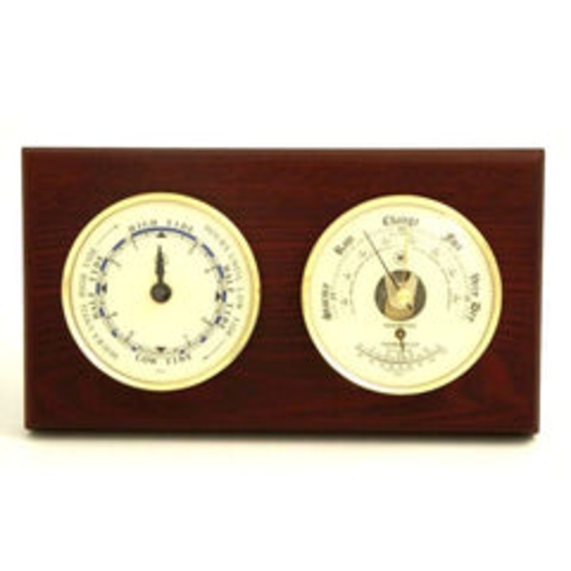 Tide Clock & Barometer With Thermometer On Mahogany Wood