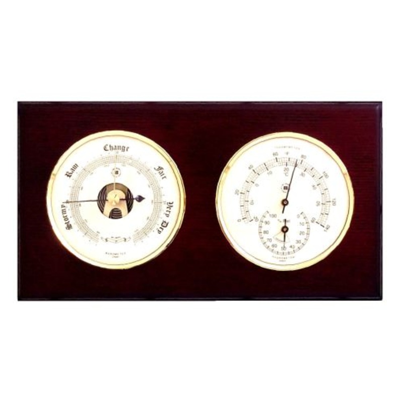Barometer & Thermometer With Hygrometer On Mahogany Wood