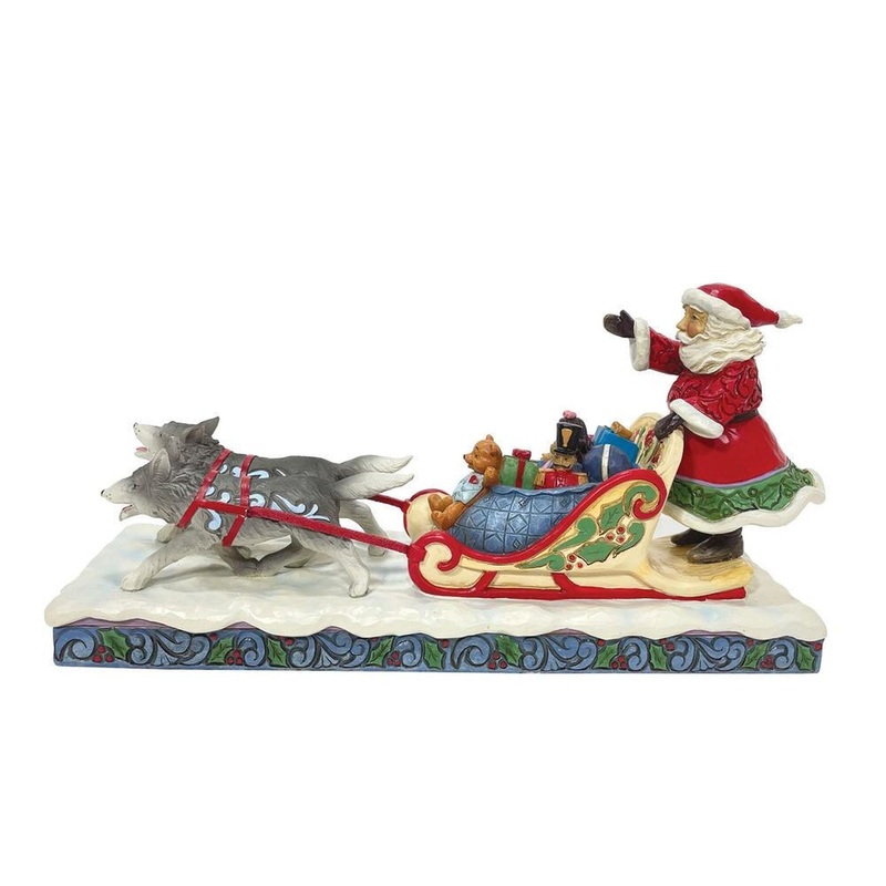 Enesco Jim Shore Heartwood Creek Santa Dog Sledding Figurine